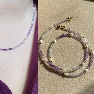 Detail view of handmade natural stone choker with amethyst, labradorite, and pearls.