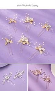 Close-up detail of bridal hair pins with gold leaves and pearls on purple background