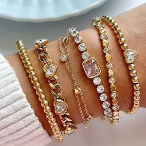 Juego de pulseras de corazón de acero inoxidable dorado con circonitas brillantes