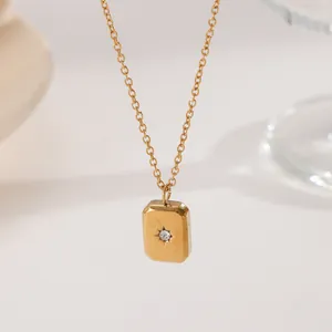 Minimalist gold rectangle pendant necklace with starburst zircon in titanium steel