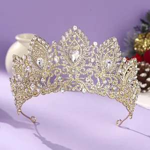 Elegant and luxurious golden rhinestone tiara crown for bridal weddings and pageants