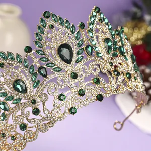 Luxurious emerald rhinestone wedding crown with gold finish for pageant and show