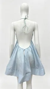 Back view of light blue halter backless pleated mini dress on a white mannequin