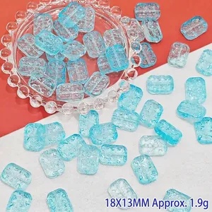 Macro detail of 18x13mm light blue textured glass beads for DIY jewelry making