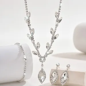 Elegant silver-tone jewelry set with marquise crystals and sparkling rhinestones