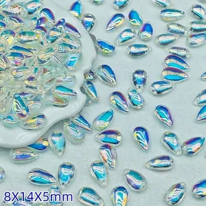Close-up of 8x14mm iridescent glass teardrop beads for DIY craft jewelry making projects