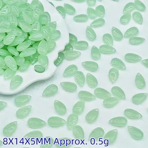 Detailed view of 8x14mm light green teardrop glass beads for DIY jewelry making