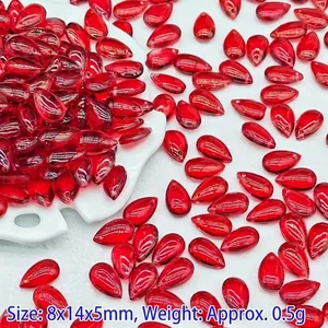 Macro view of 8x14mm red teardrop glass beads for DIY jewelry and hair accessories