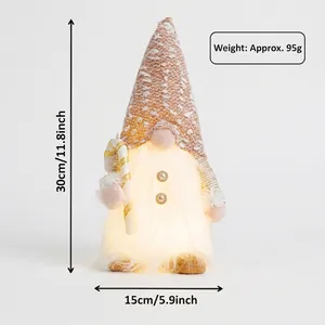 Detailed view of a glowing Christmas gnome ornament featuring a sequined hat and product dimensions.