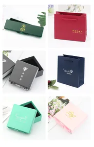 Elegante varietà di scatole regalo per gioielli e sacchetti di carta in vari colori e stili