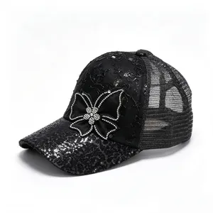 Stylish black mesh baseball cap for women featuring a rhinestone butterfly and lace details.