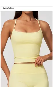 Detailed close-up of a pale yellow yoga tank top made of nude-feel high elasticity fabric