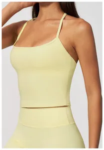 High-quality close-up of a pale yellow nude-feel yoga tank top with slim fit design