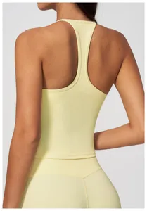 Detailed back view of a pale yellow racerback yoga tank top designed for fitness and running