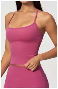 Close-up detail of a pink nude feel yoga tank top featuring thin shoulder straps and a slim fit