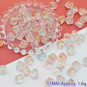 Detailansicht von 11 mm schillernden Löwentanz-Perlen für DIY-Schmuck