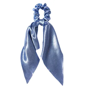 Blue satin ribbon scrunchie for hair with elegant long bow tails.