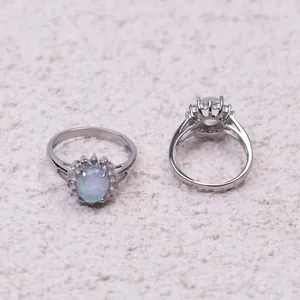 Elegant stainless steel sunflower ring with oval opal stone and crystal halo