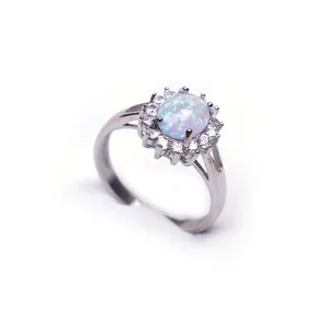 Sunflower 316L stainless steel ring with round opal and zircon halo setting