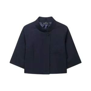 Detailed view of navy blue minimalist women's stand collar blazer with 3/4 sleeves