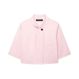 Detailed view of a stylish pink cropped suit jacket with three-quarter sleeves and button