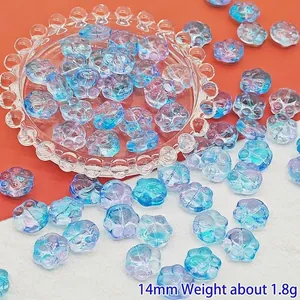 Detailed macro view of 14mm gradient cat paw glass beads for DIY jewelry making