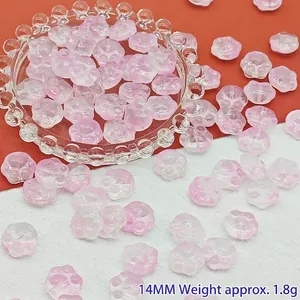 Detailed macro view of 14mm pink gradient cat paw glass beads for DIY jewelry making