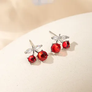 Elegant red cherry stud earrings with sparkling red crystals and silver metal finish