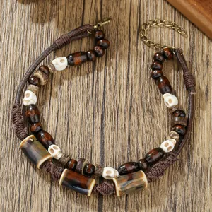 Bohemian ethnic style wood bead anklet with skull charms and adjustable cord for men