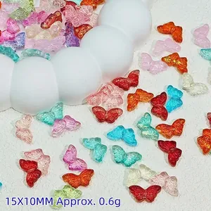 Close-up of colorful transparent butterfly beads for DIY jewelry making
