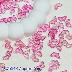 Detailed view of pink butterfly glass beads showing 15x10mm size and 0.6g weight