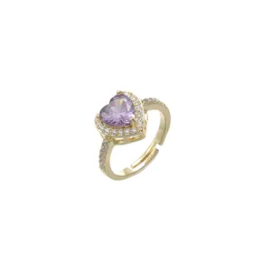 Elegant gold plated adjustable heart ring featuring a purple zircon center stone and pave accents
