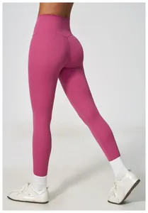 Back view of high-waisted magenta yoga leggings showing a supportive booty lifting fit