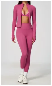 Full view of magenta high-waisted yoga leggings and zip-up jacket fitness set
