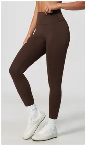 Close-up detail of high-waisted butt-lifting brown yoga leggings for women's fitness.