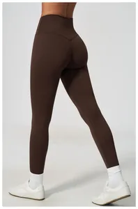 Macro view of dark brown high-waisted leggings showcasing the seamless butt-lifting design.