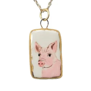 Minimalist rectangular pendant necklace with sweet hand-painted pink pig illustration detail