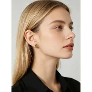 Elegant S925 sterling silver flower stud earrings with green crystals for women's fashion
