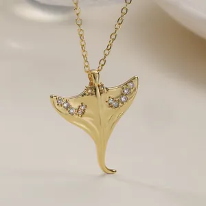 Elegant gold plated manta ray pendant necklace with sparkling zirconia stones for women