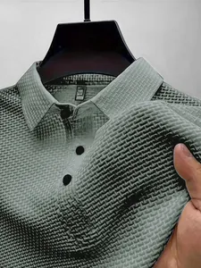 Detail of breathable ice silk mesh fabric texture on a high-end men's polo shirt.
