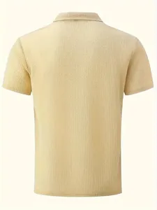 Detailed back view of a men's short-sleeved polo shirt with textured mesh knit fabric