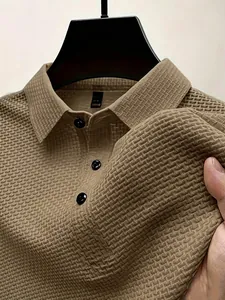 Close-up of brown ice silk mesh polo shirt showing detailed fabric texture and collar.