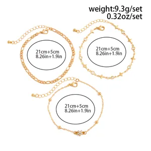 Detailed view of a three-piece gold anklet set with 21cm plus 5cm length annotations