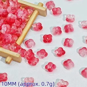 Close-up of 10mm pink gradient glass flower beads for DIY ancient Chinese hairpins.