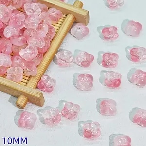 Detail of 10mm pink translucent glass flower beads for DIY hair accessories