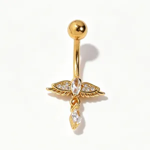 Detailed close-up of gold winged belly button ring with shimmering marquise zircon drop charm