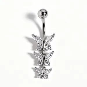 Detailed view of silver belly ring featuring three dangling crystal butterfly charms