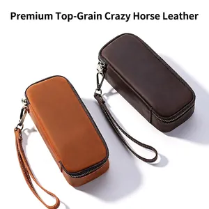 Detail showing premium top-grain crazy horse leather pipe storage pouches in brown