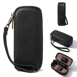 Multi-angle detail views of a vintage black leather pipe bag featuring interior storage