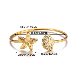 Detailed dimensions of gold starfish and seashell open bangle in titanium steel.